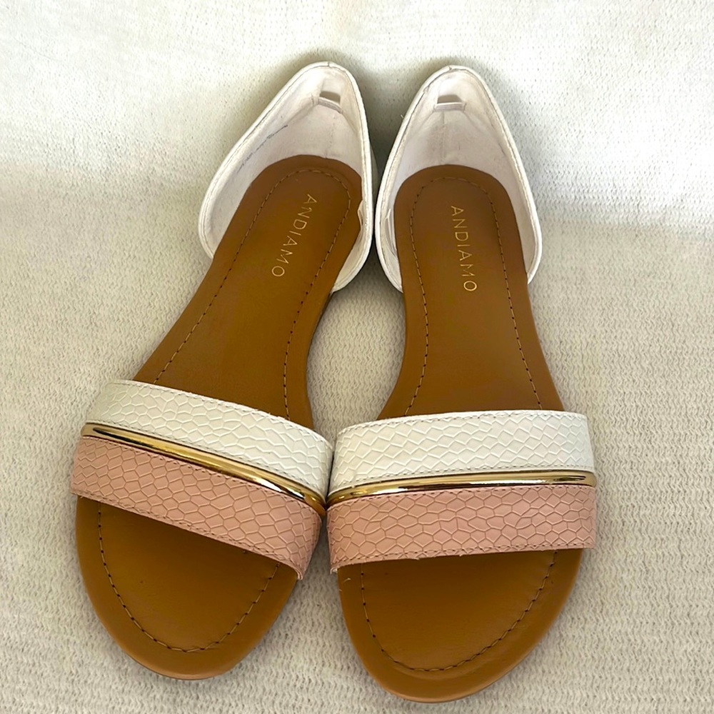Women’s sandals size 8. Like new. Stylish, comfy, pink and white with gold trim.